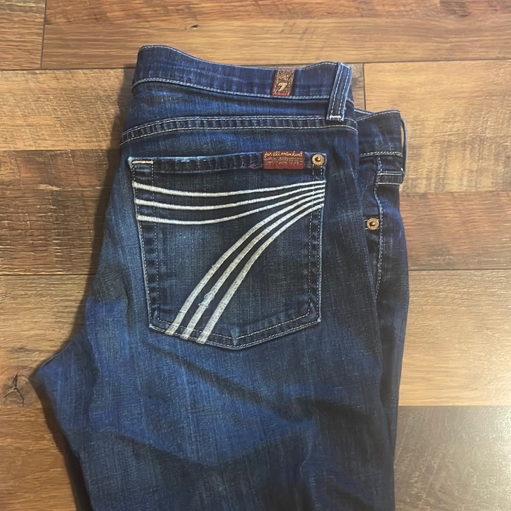 7 For All Mankind. Slight wear on the bottom hem as seen in pictures.